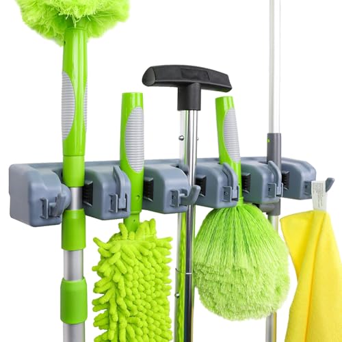Gray Amazon Basics wall-mount broom and mop holder installed